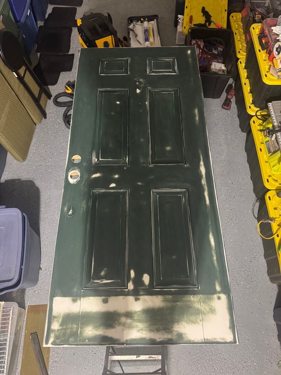 The door laid flat during prep, sanded back to a smooth surface